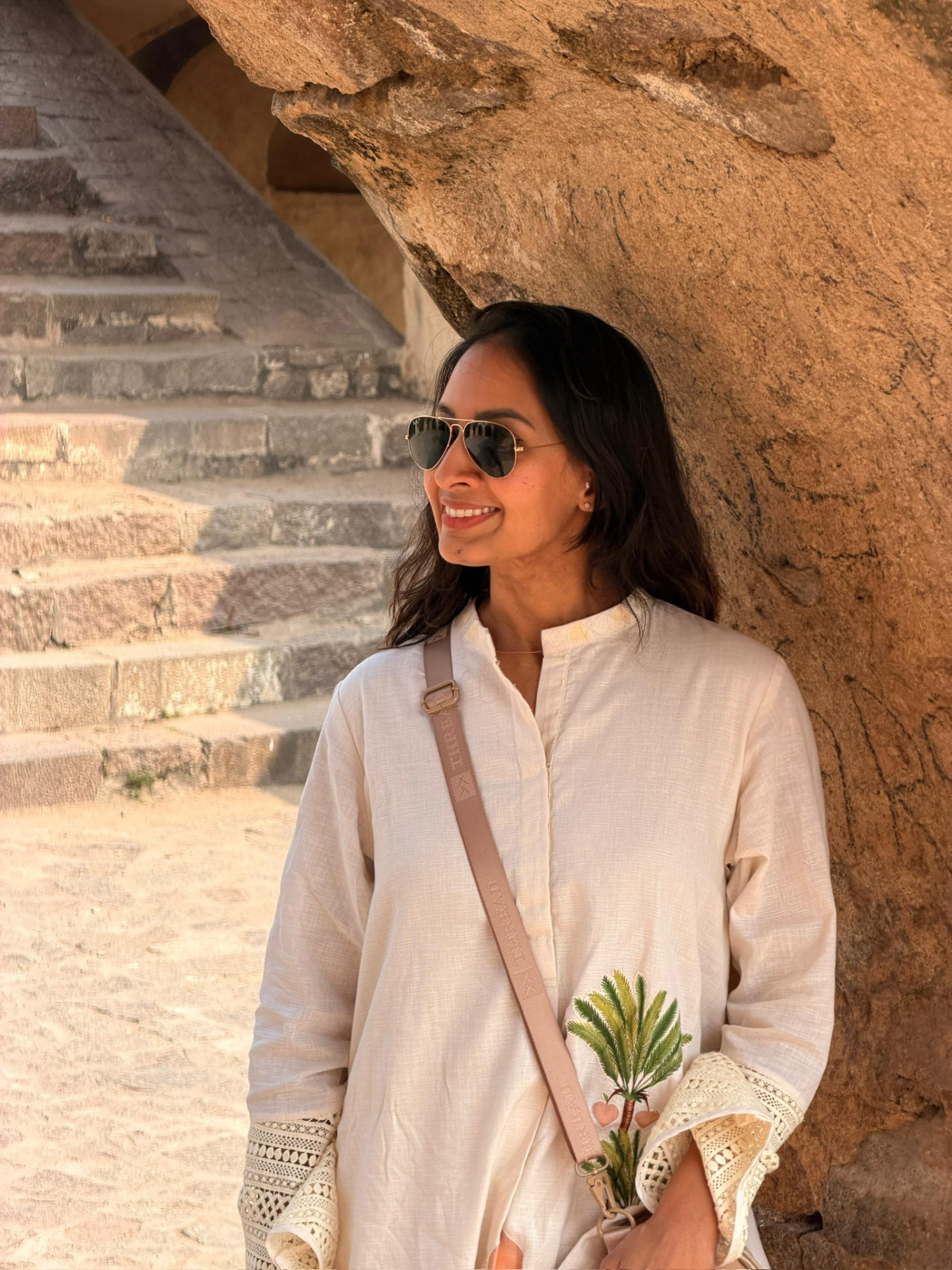 Sangita at the ancient stone steps in India